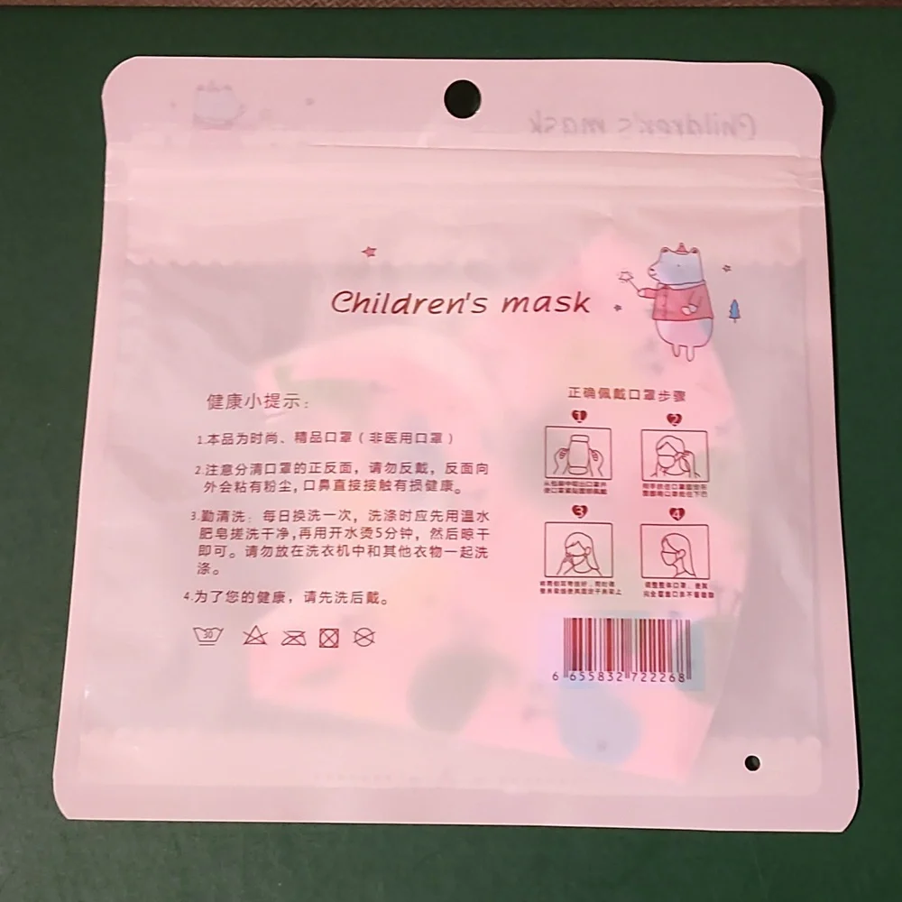 Children's re Usable face mask new in package never opened